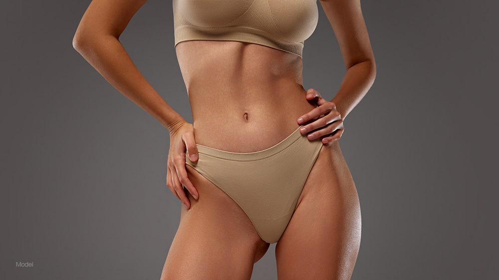 curvy woman in tan underwear