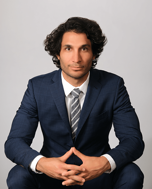 Photo of Dr. Adeeb Derakhshan in a business suit